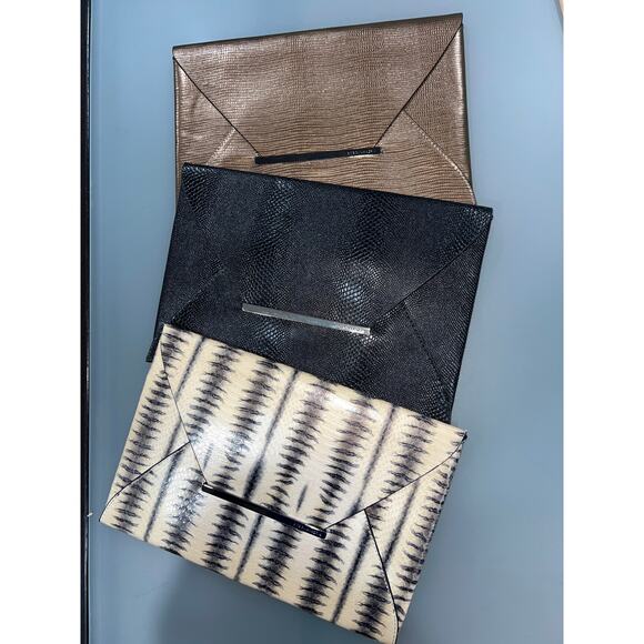 BCBGMaxAzria Clutch Bundle (3) Black Bronze & Black/White Envelope Bags Sale!
As - Picture 3 of 11